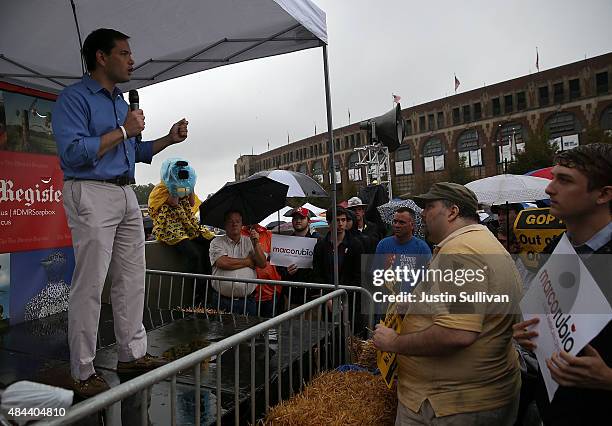Republican presidential candidate and U.S. Sen. Marco Rubio speaks to fairgoers during the Iowa State Fair on August 18, 2015 in Des Moines, Iowa....