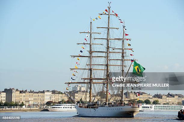 This photo taken on August 17, 2015 shows the tri-masted "Cisne Branco," a Brazilian sail-training yacht docked in Bordeaux. AFP PHOTO / JEAN-PIERRE...