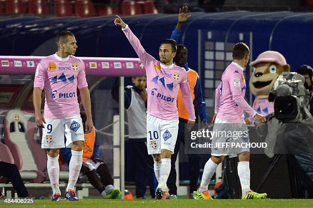 Evian's French midfielder Nicolas Benezet celebrates after scoring a goal during the French L1 football match between Evian Thonon Gaillard and SC...