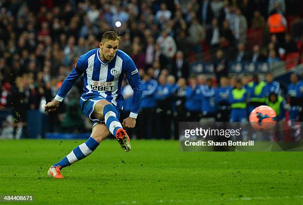 Jack Collison of Wigan Athletic shoots and misses in the penalty shoot out during the FA Cup Semi-Final match between Wigan Athletic and Arsenal at...