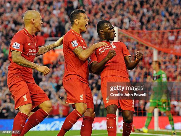 Christian Benteke of Liverpool celebrates his goal with his team mates Martin Skrtel and Dejan Lovren during the Barclays Premier League match...