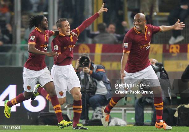 Rodrigo Taddei with his teammate Gervinho and Maicon of AS Roma celebrates after scoring the opening goal during the Serie A match between AS Roma...
