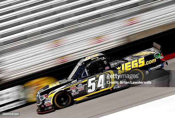 Kyle Busch, driver of the JEGS Toyota, practices for the NASCAR Camping World Truck Series UNOH 200 race at Bristol Motor Speedway on August 18, 2015...