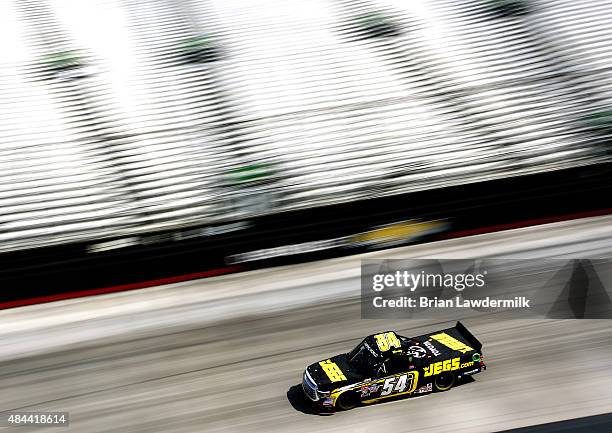 Kyle Busch, driver of the JEGS Toyota, practices for the NASCAR Camping World Truck Series UNOH 200 race at Bristol Motor Speedway on August 18, 2015...