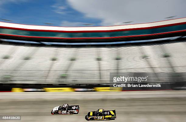 Kyle Busch, driver of the JEGS Toyota, practices for the NASCAR Camping World Truck Series UNOH 200 race at Bristol Motor Speedway on August 18, 2015...