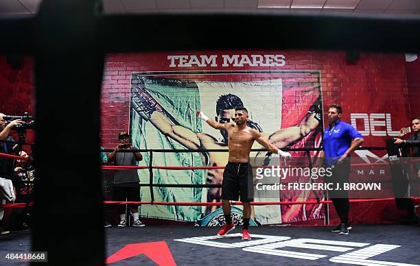 Mexican Boxer Abner Mares warms up before working out for the media on August 18, 2015 in Bell Gardens, California. Mares is training ahead of his...