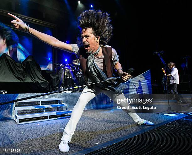 Kelly Hansen of Foreigner performs during the First Kiss: Cheap Date Tour at DTE Energy Music Theater on August 14, 2015 in Clarkston, Michigan.