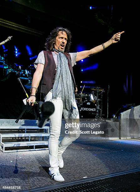 Kelly Hansen of Foreigner performs during the First Kiss: Cheap Date Tour at DTE Energy Music Theater on August 14, 2015 in Clarkston, Michigan.