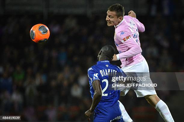 Evian's Argentinean forward Marco Ruben vies with Bastia's Mailian defender Drissa Diakite during the French L1 football match between Evian Thonon...