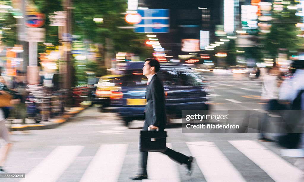 Buisnessman crossing the street