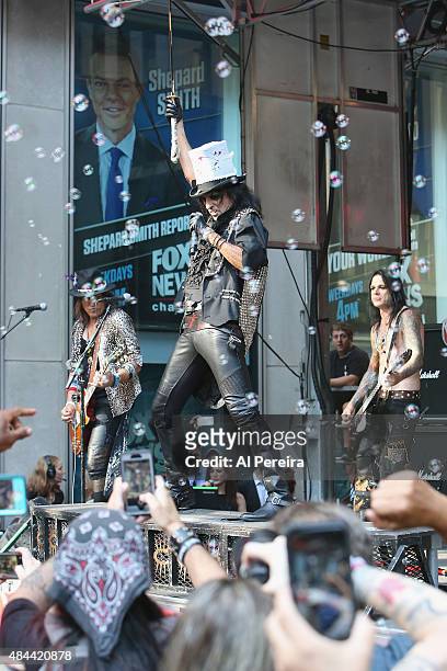 Alice Cooper performs amid a shower of soap bubbles during "FOX & Friends" All American Concert Series outside of FOX Studios on August 14, 2015 in...