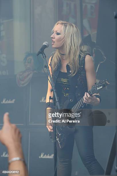 Guitarist Nita Strauss performs with Alice Cooper during "FOX & Friends" All American Concert Series outside of FOX Studios on August 14, 2015 in New...