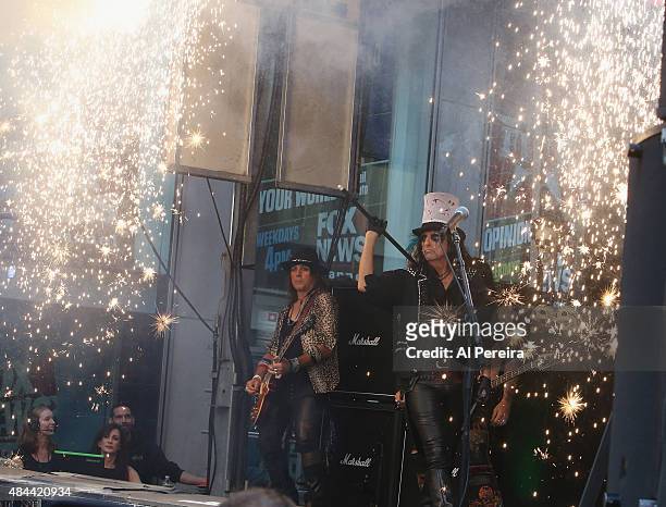 Alice Cooper is amid a curtain of sparks when he performs during "FOX & Friends" All American Concert Series outside of FOX Studios on August 14,...