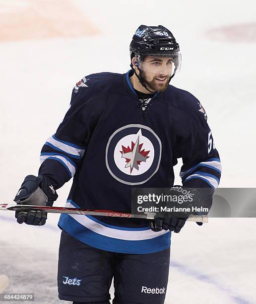 Eric O'Dell of the Winnipeg Jets skates down the ice during warmup before an NHL game against the Pittsburgh Penguins at the MTS Centre on April 3,...