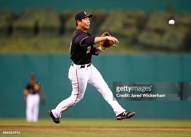 Jung Ho Kang of the Pittsburgh Pirates throws to first base in the second inning against the Arizona Diamondbacks during the game at PNC Park on...