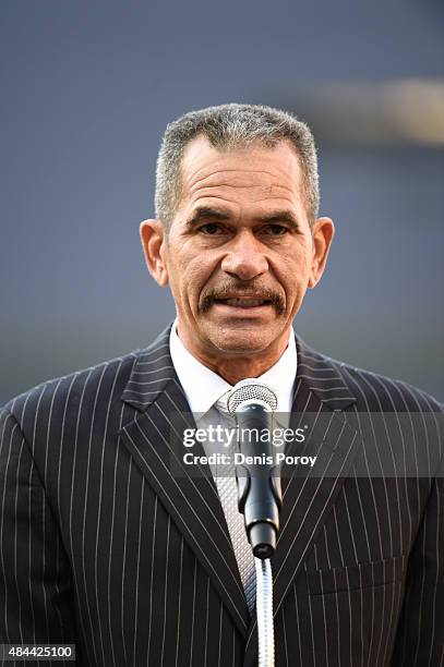 Former San Diego Padres catcher Benito Santiago speaks as he's inducted into the San Diego Padres Hall of Fame before a baseball game between the...