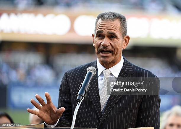 Former San Diego Padres catcher Benito Santiago speaks as he's inducted into the San Diego Padres Hall of Fame before a baseball game between the...