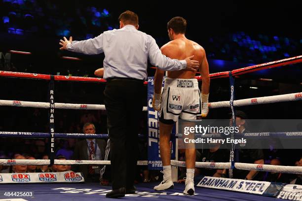 Frank Buglioni is led back to his corner after being defeated by Sergey Khomitsky during their WBO European Super-Middleweight Championship bout at...