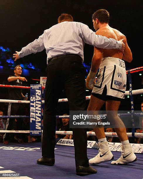 Frank Buglioni is led back to his corner after being defeated by Sergey Khomitsky during their WBO European Super-Middleweight Championship bout at...