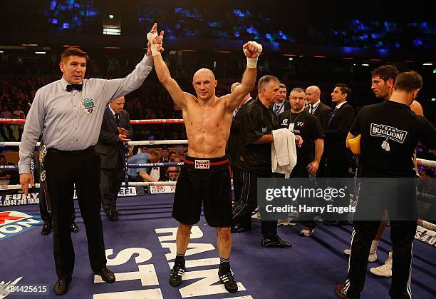 Sergey Khomitsky celebrates defeating Frank Buglioni during their WBO European Super-Middleweight Championship bout at The Copper Box on April 12,...