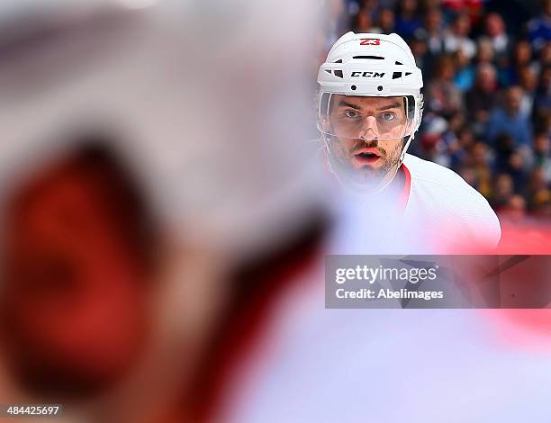 Brian Lashoff of the Detroit Red Wings watches the play during NHL action against the Toronto Maple Leafs at the Air Canada Centre March 29, 2014 in...
