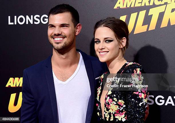 Actors Taylor Lautner and Kristen Stewart attend PalmStar Media And Lionsgate's "American Ultra" premiere at the Ace Theater Downtown LA on August...