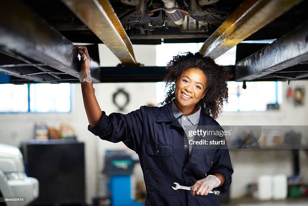 Female garage mechanic portrait