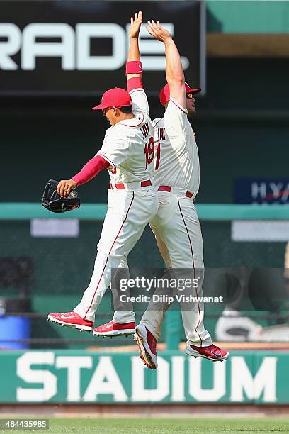 Matt Holliday and Jon Jay of the St. Louis Cardinals celebrate after beating the Chicago Cubs at Busch Stadium on April 12, 2014 in St. Louis,...