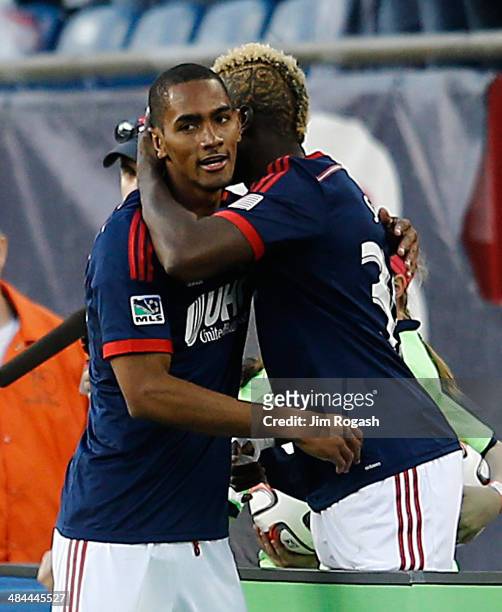 Jerry Bengtson of the New England Revolution celebrates his goal with Saer Sene against the Houston Dynamo in the 2nd half at Gillette Stadium on...