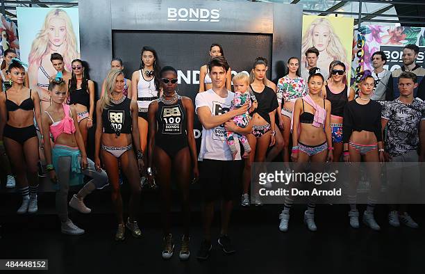 Models pose during Bonds 100th birthday celebration event at Cafe Sydney on August 19, 2015 in Sydney, Australia.