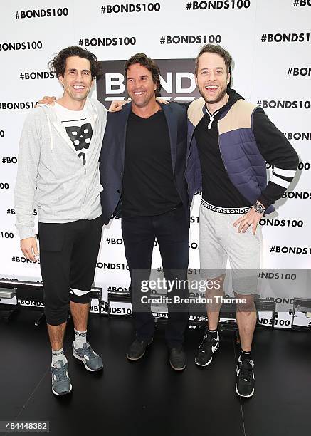 Andy Lee, Pat Rafter and Hamish Blake pose during Bonds 100th birthday celebration event at Cafe Sydney on August 19, 2015 in Sydney, Australia.