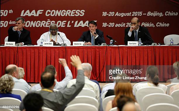 Newly elected IAAF President Lord Sebastian Coe answers questions from the media with outgoing IAAF president Lamine Diack alongside him during a...