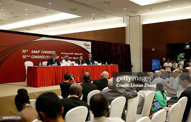 Newly elected IAAF President Lord Sebastian Coe answers questions from the media with outgoing IAAF president Lamine Diack alongside him during a...