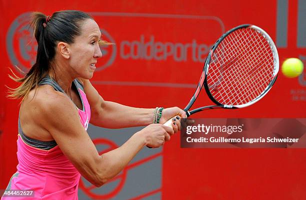 Tennis player Jelena Jankovic of Serbia returns a ball to player Chanelle Scheepers of South African Republic, during their WTA Bogota Open semifinal...