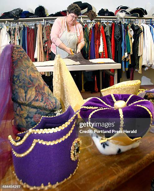 Staff photo by Doug Jones : Thursday, September 27, 2007: Kris Cornish cuts from patterns for a special order with matching crowns in the foreground...