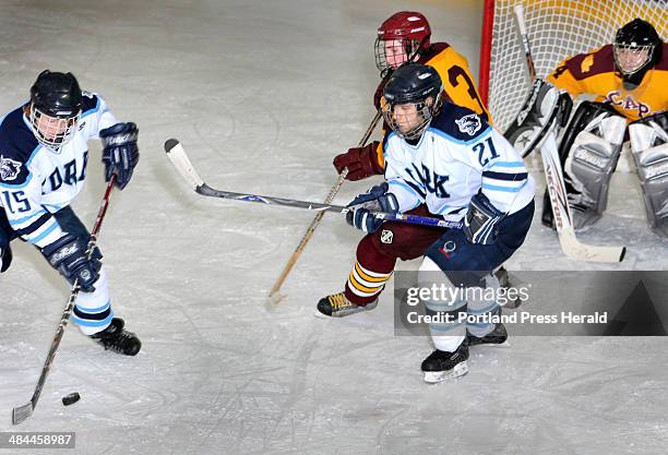 Jill Brady/Staff Photographer: -- York Dillon Della Pasqua sets up for a shot while teammate Kevin Maran braces in front of Cape Peter Kelley and...