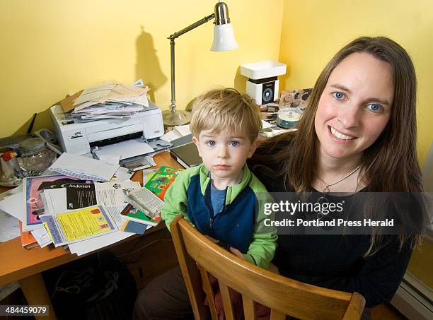 John Ewing/Staff Photographer: -- Thursday, January 3, 2008 -- .Julie Falatko, of South Portland, here with her son, Eli, has spent the past year...