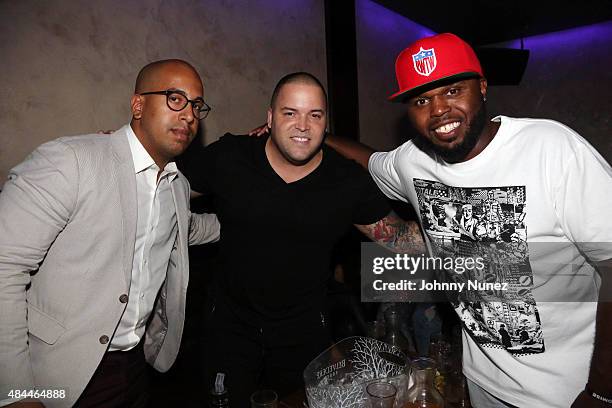 Promoter Michael Carrasquillo, music executive Johnny Marines, and DJ Steph Floss attend the Punk'd! Private Celebrity Viewing Party at The Royal on...