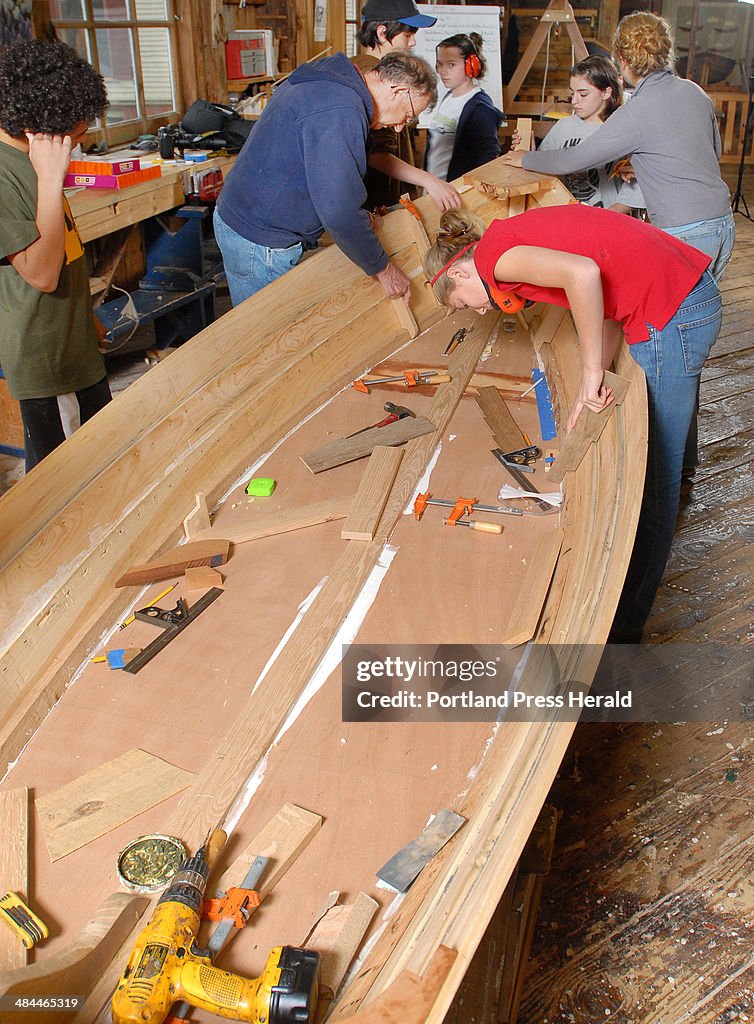 SOUTH BRISTOL 8TH GRADERS BUILDING BOATS AT Maine Maritime Museum in Bath. Here, students and instru