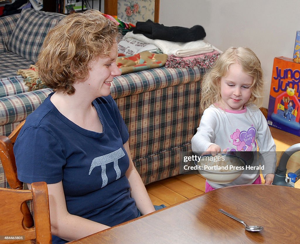 Friday, May 04, 2007. Features of Jennifer Mallett and family preparing diner for Maine Life Centerp