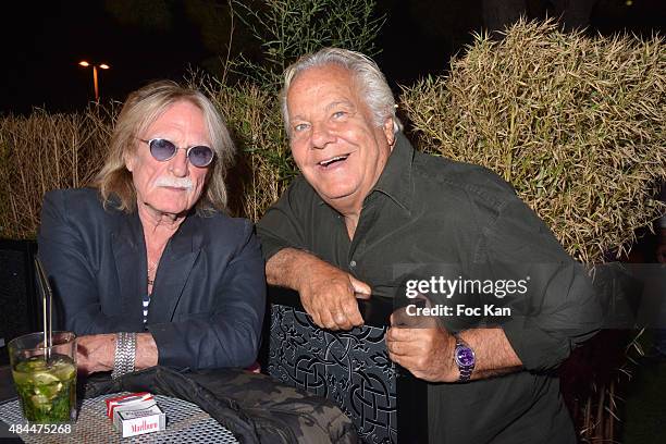 Singer Christophe and Massimo Gargia attend the Tsar Party at the Tsar Club in Saint Tropez on August 18, 2015 in Saint Tropez, France.