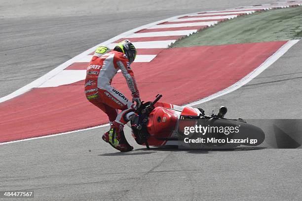 Cal Crutchlow of Great Britain and Ducati team crashes during the MotoGp Red Bull U.S. Grand Prix of The Americas - Free Qualifying at Circuit of The...