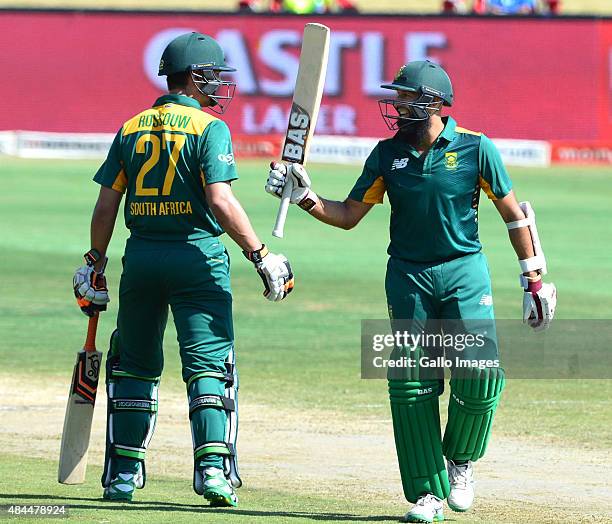 Hashim Amla of South Africa celebrates his 50 runs during the 1st ODI match between South Africa and New Zealand at SuperSport Park on August 19,...