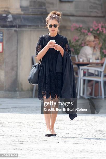 Hannah Ware is seen checking her smartphone in Berlin on August 19, 2015 in Berlin, Germany.