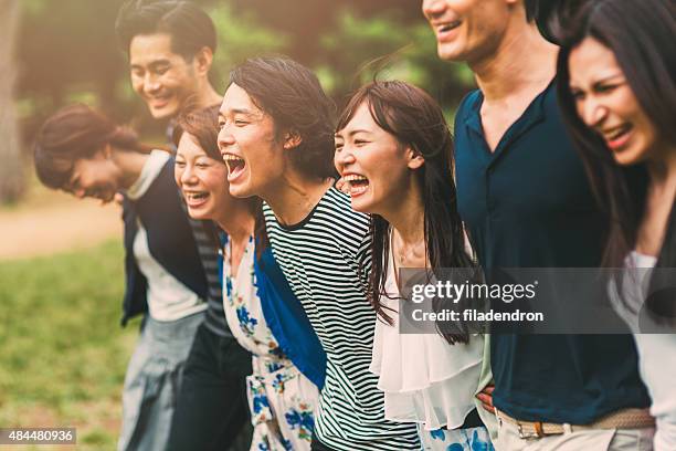 big friend hug - midden oosterse etniciteit stockfoto's en -beelden