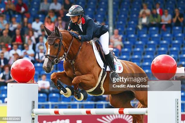 Penelope Leprevost of France competes on her horse Flora de Mariposa during the Turkish Airlines Prize Individual Show Jumping competition on Day 8...