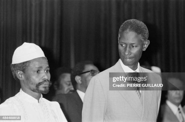 Senegalese President Abdou Diouf looks at Chad president Hissene Habre, on October 08 at the opening session of Franco-African summit in Kinshasa.