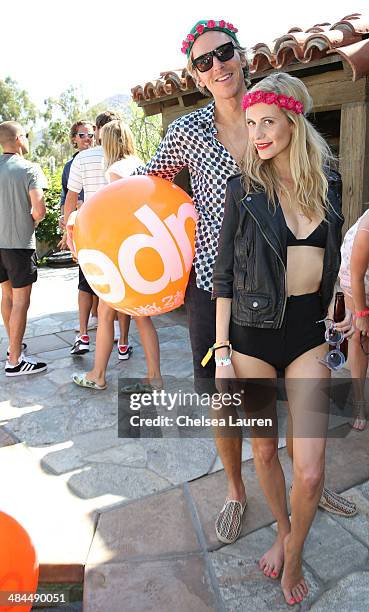 James Cook and model Poppy Delevingne attend the Superdry Coachella brunch hosted by Poppy Delevingne on April 12, 2014 in Palm Springs, California.