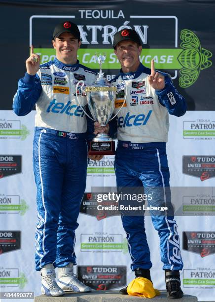 Memo Rojas of Mexico and Scott Pruett drivers of the Chip Ganassi Racing Riley DP Ford EcoBoost celebrate after winning the Tudor United Sports Car...