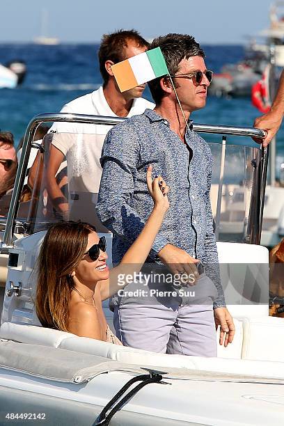 Noel Gallagher and his girlfriend Sarah Mc Donaldleave the 'Club 55' on August 19, 2015 in Saint-Tropez, France.